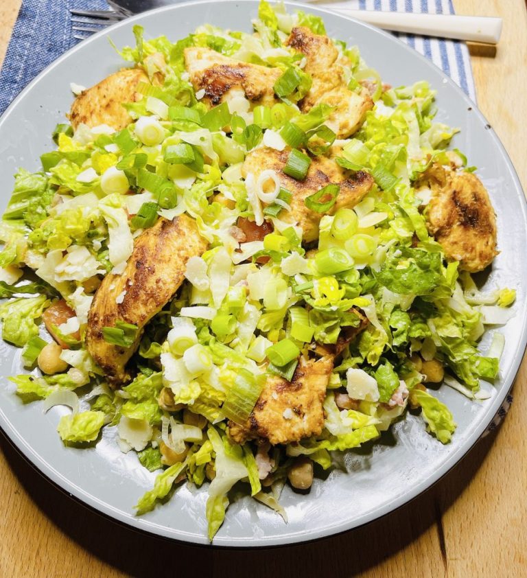 Caesar salad with marinated chicken